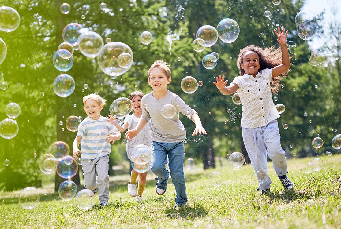 children-playing-with-bubbles